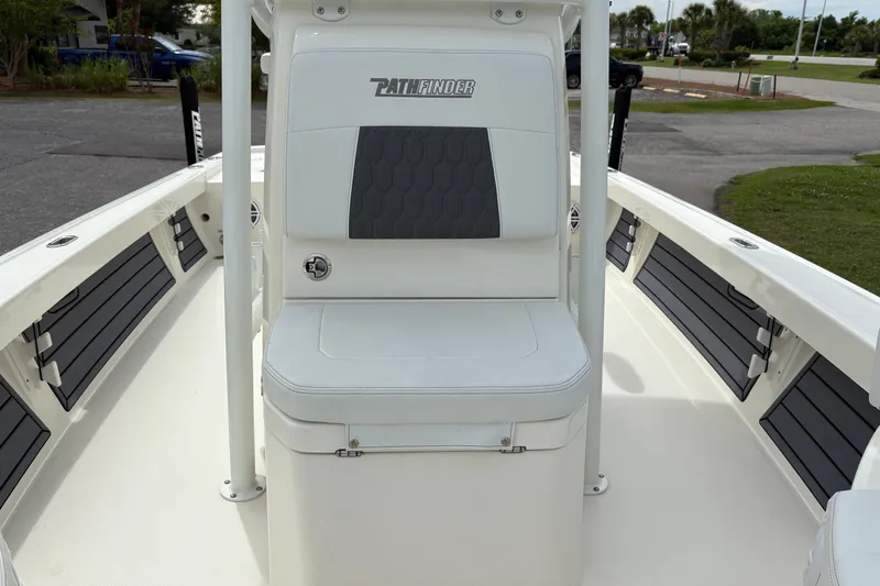 Slide: The Image of 2025 Pathfinder 2200 TRS boat interior with seating and storage compartments. - 28