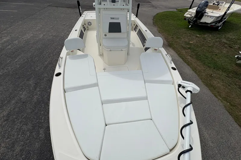 Slide: The Image of 2025 Pathfinder 2200 TRS boat with spacious deck and Garmin trolling motor. - 32