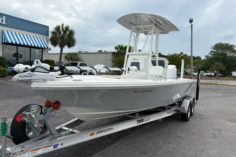 Slide: The Image of 2025 Pathfinder 2200 TRS boat on trailer, equipped with Garmin technology. - 6