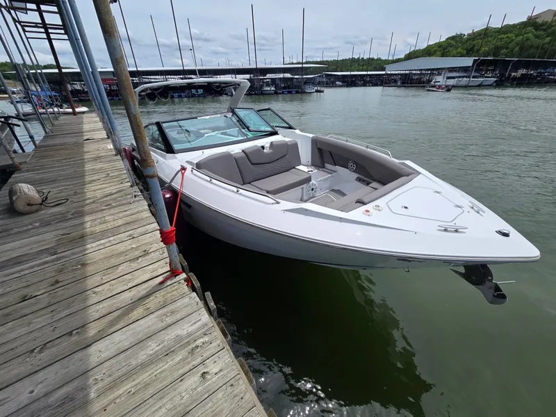 Slide: The Image of 2021 Cruisers Yachts 338 at dock, modern design. - 11
