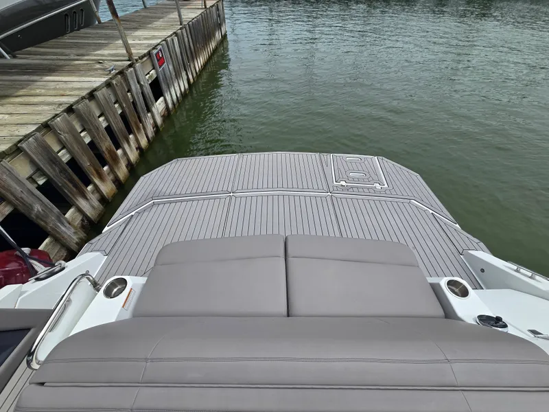 Slide: The Image of Rear view of 2021 Cruisers Yachts 338 at dock. - 12