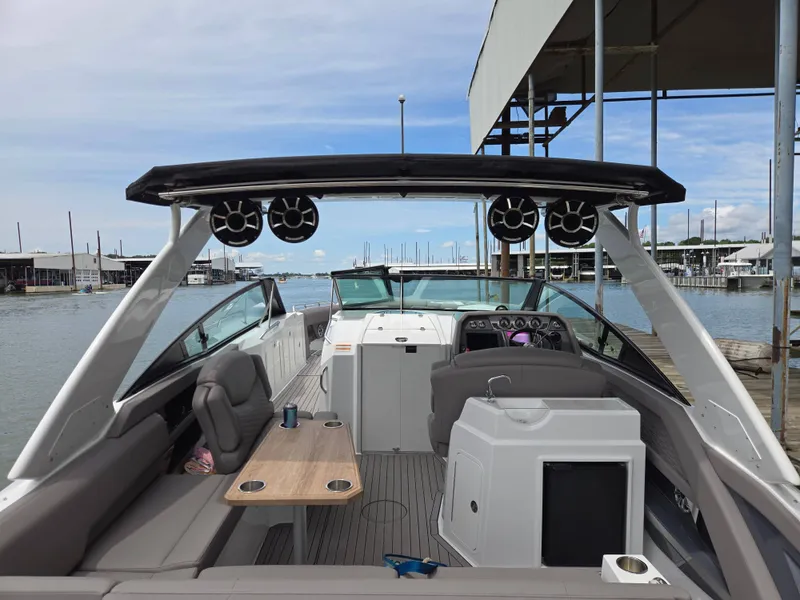 Slide: The Image of Interior view of a 2021 Cruisers Yachts 338 at the dock. - 14