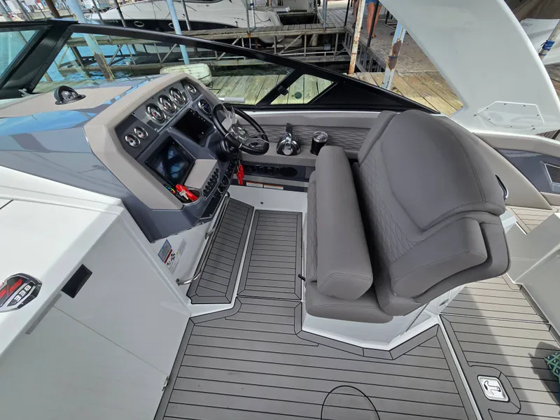 Slide: The Image of Interior view of 2021 Cruisers Yachts 338 cockpit. - 21