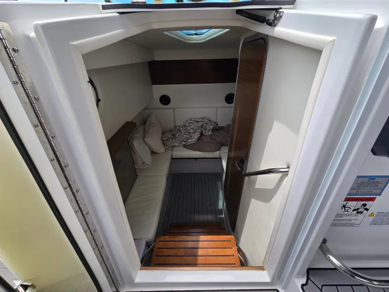 Slide: The Image of Interior of 2021 Cruisers Yachts 338 with cozy cabin. - 27