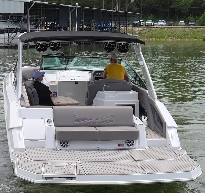 Slide: The Image of 2021 Cruisers Yachts 338 on a calm lake. - 5
