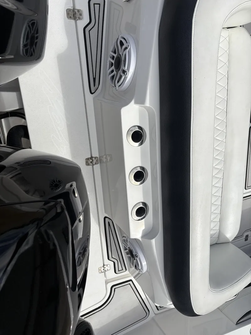 Slide: The Image of Interior of a 2015 Nor-Tech 340 Sport boat with speakers. - 11