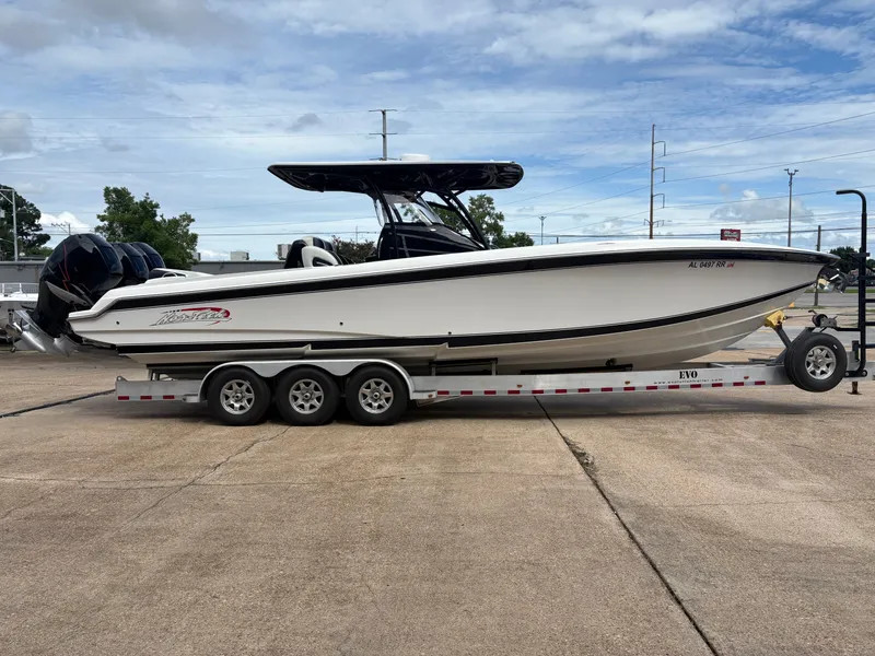 Slide: The Image of 2015 Nor-Tech 340 Sport boat on trailer, side view. - 3