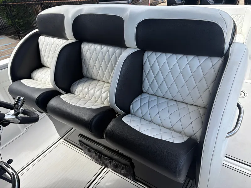 Slide: The Image of Luxurious seating in a 2015 Nor-Tech 340 Sport boat. - 6