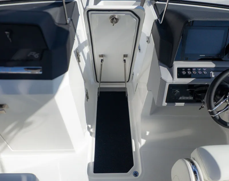 Slide: The Image of Interior of Cobalt R6 boat, 2026 model, featuring helm console. - 19