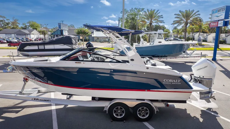 Slide: The Image of 2026 Cobalt R6 boat on trailer at Bluewater Marine. - 4