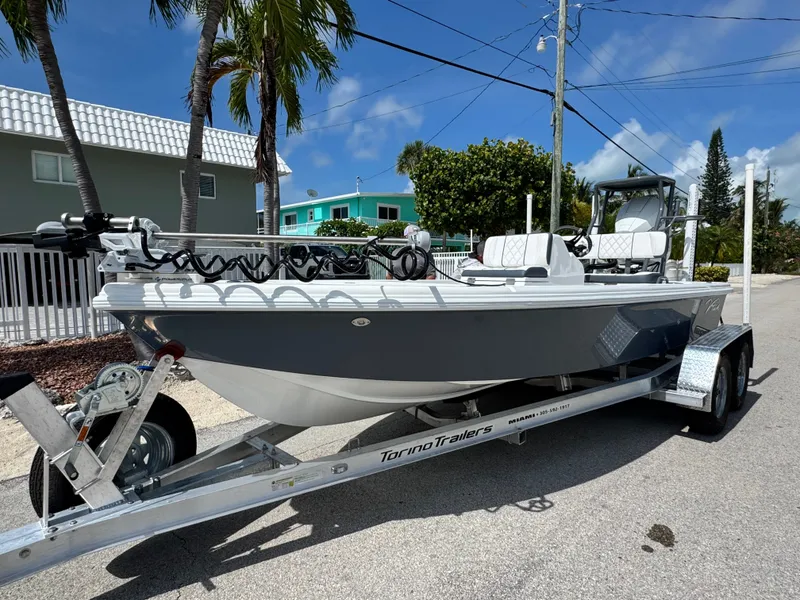 The Image of Vtech 18' Flats boat on trailer, 2027 model, sunny day. - 0