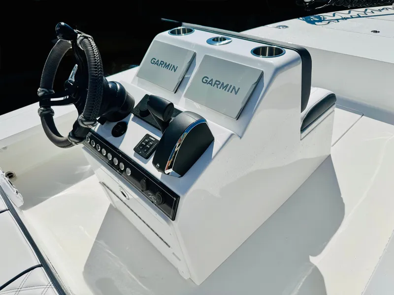 Slide: The Image of Control console of a Vtech 18' Flats boat, year 2027. - 11