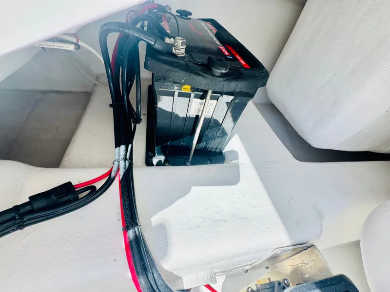Slide: The Image of Vtech 18' Flats 2027 boat battery with cables. - 16