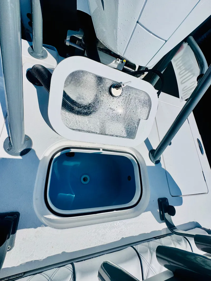 Slide: The Image of Vtech 18' Flats 2027 boat with built-in sink and storage compartment. - 20