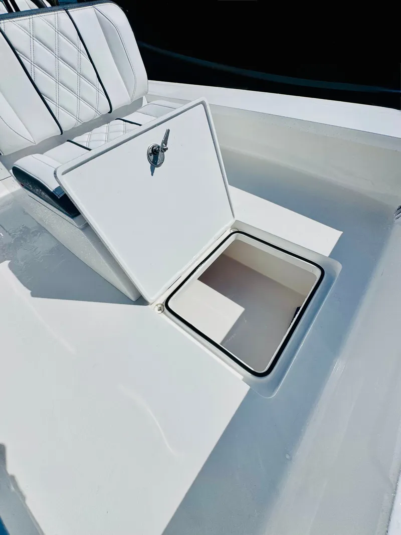 Slide: The Image of Vtech 18' Flats boat with open storage compartment, 2027 model. - 26
