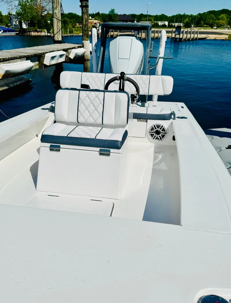 Slide: The Image of Vtech 18' Flats boat, modern design, 2027 model at dock. - 31