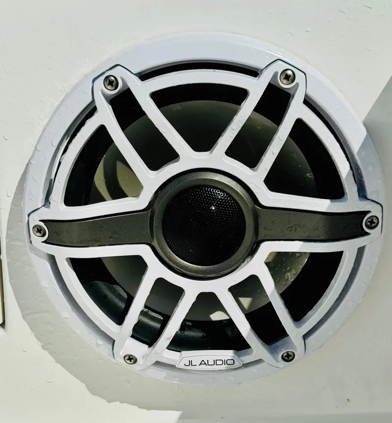 Slide: The Image of Close-up of a JL Audio speaker on a Vtech 18' Flats 2027. - 32