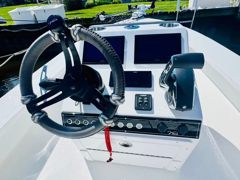 Slide: The Image of Control console of a Vtech 18' Flats boat, year 2027. - 4