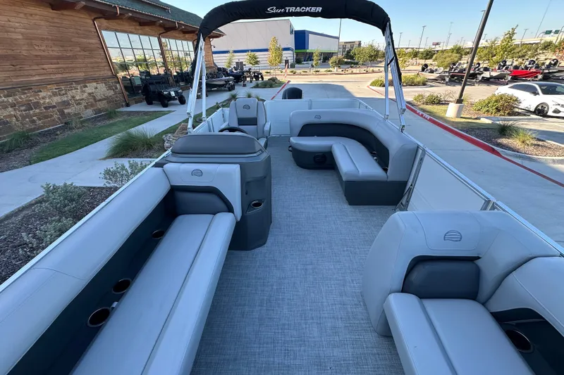 Slide: The Image of 2026 Sun Tracker Party Barge 18 DLX pontoon boat with spacious seating and modern design. - 27