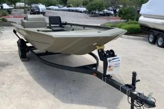 The Image of 2026 Tracker Grizzly 1754 SC boat on trailer in outdoor setting. - 0