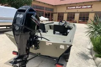 Slide: The Image of 2026 Tracker Grizzly 1754 SC boat with Mercury 60 engine at Tracker Boat Center. - 9