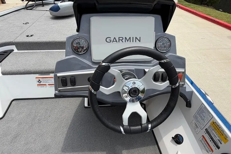 Slide: The Image of Steering console of 2026 Nitro Z18 Pro boat with Garmin display and gauges. - 13