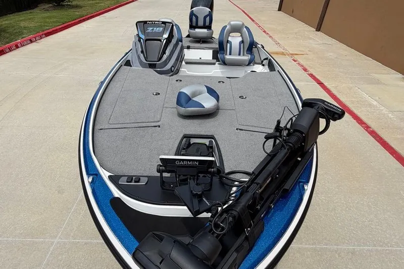 Slide: The Image of 2026 Nitro Z18 Pro boat with Garmin equipment, featuring sleek design and comfortable seating. - 9
