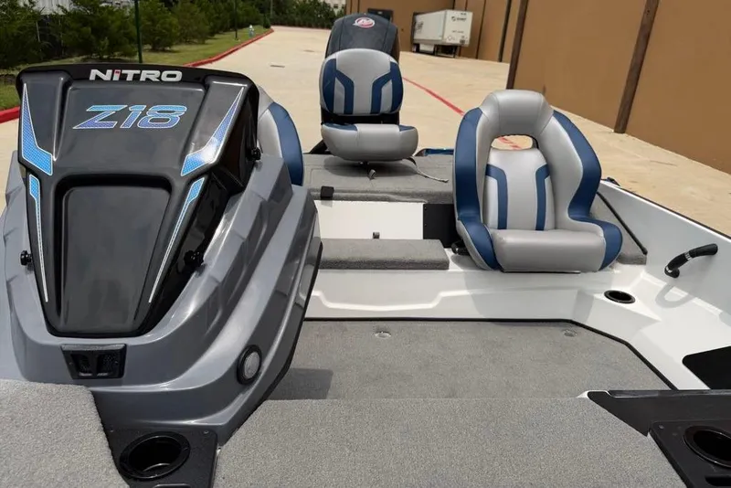 Slide: The Image of 2026 Nitro Z18 Pro boat interior with sleek seating and modern design. - 18