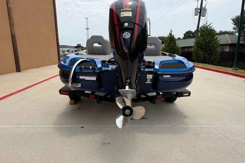 Slide: The Image of Rear view of a 2026 Nitro Z18 Pro boat with an outboard motor. - 5