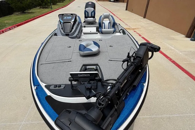 Slide: The Image of 2026 Nitro Z18 Pro boat with Garmin equipment, featuring sleek design and comfortable seating. - 8