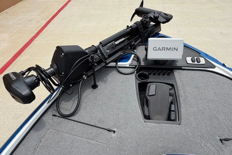 Slide: The Image of 2026 Nitro Z18 Pro boat with Garmin navigation system and trolling motor on deck. - 15