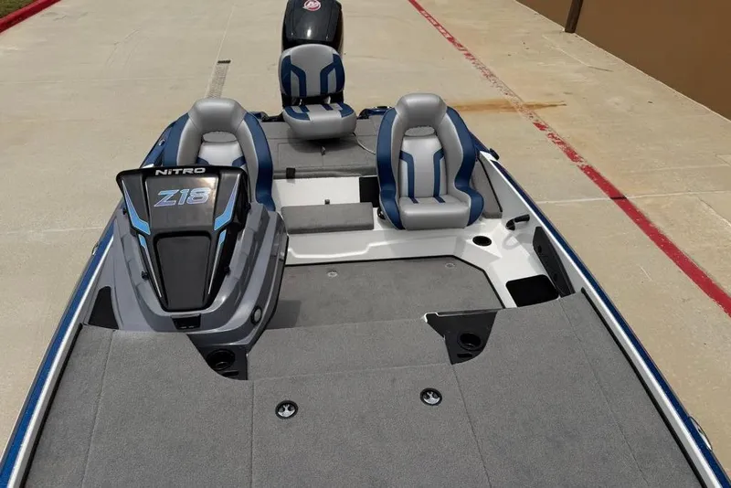Slide: The Image of 2026 Nitro Z18 Pro boat interior with sleek seating and modern design. - 16