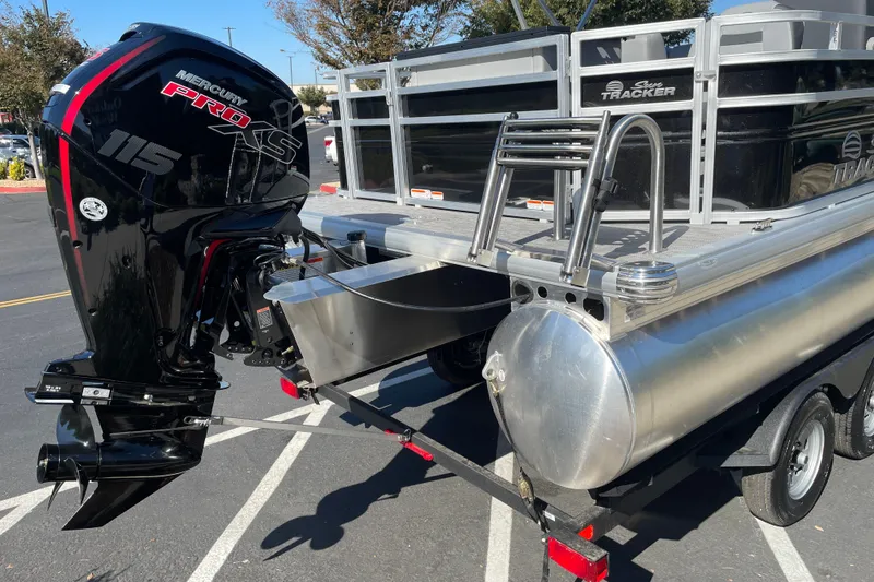 Slide: The Image of 2026 Sun Tracker SportFish 20 DLX pontoon boat with Mercury Pro XS 115 engine. - 23