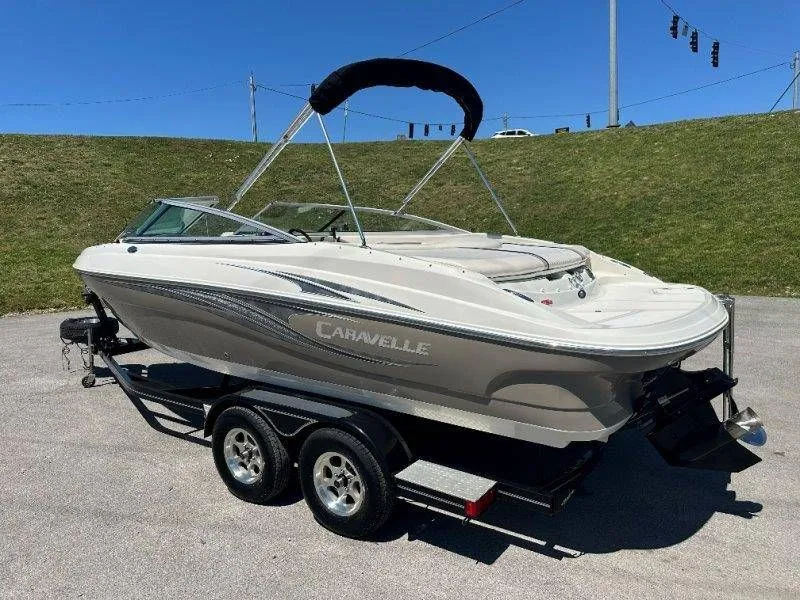 Slide: The Image of 2009 Caravelle 237 boat on trailer, sunny day. - 14