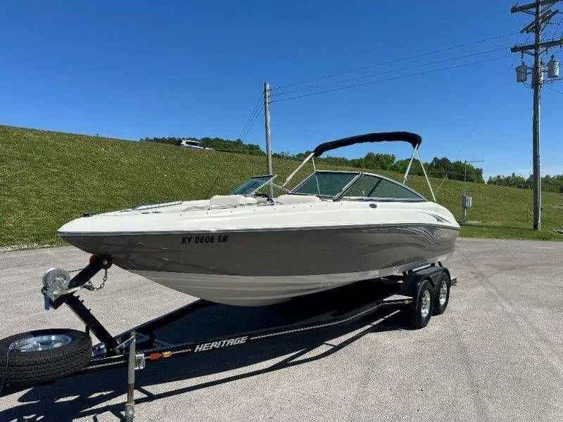 Slide: The Image of 2009 Caravelle 237 boat on trailer in sunny weather. - 15