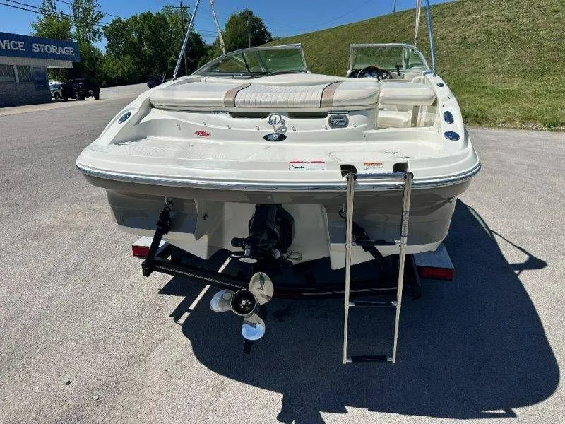 Slide: The Image of Rear view of a 2009 Caravelle 237 boat on a trailer. - 18