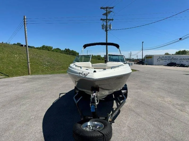 Slide: The Image of 2009 Caravelle 237 boat on trailer in sunny weather. - 21