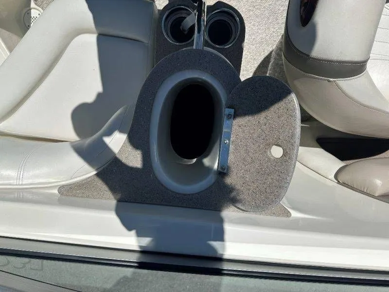 Slide: The Image of Interior of a 2009 Caravelle 237 with cup holders. - 30