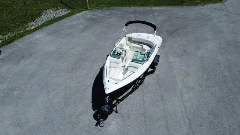 Slide: The Image of Aerial view of a 2009 Caravelle 237 boat on a trailer. - 4