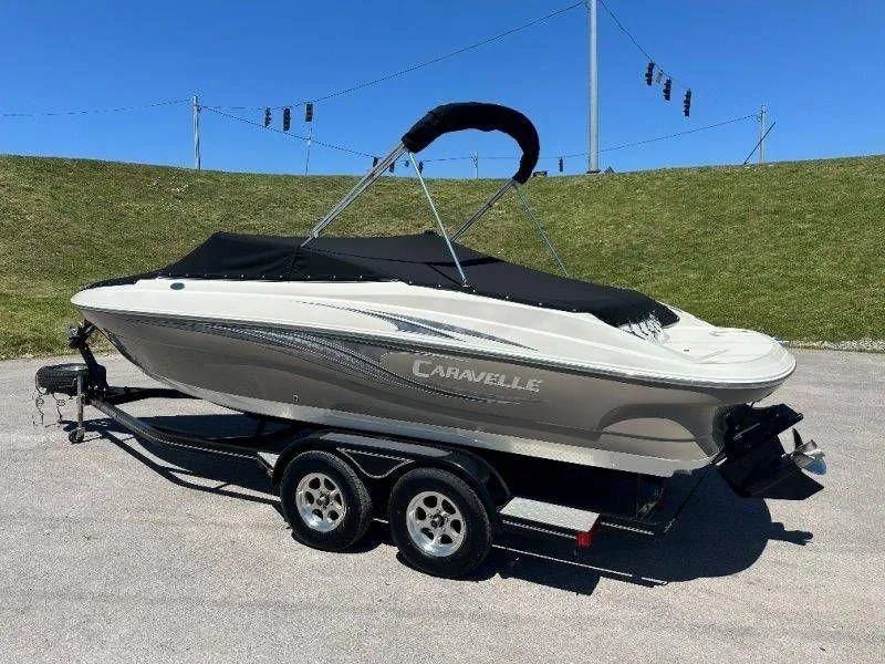 Slide: The Image of 2009 Caravelle 237 boat on trailer, side view. - 45