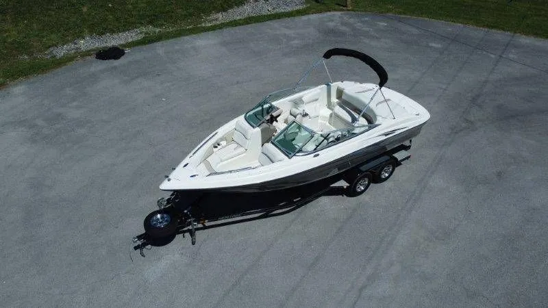Slide: The Image of Aerial view of a 2009 Caravelle 237 boat on a trailer. - 6