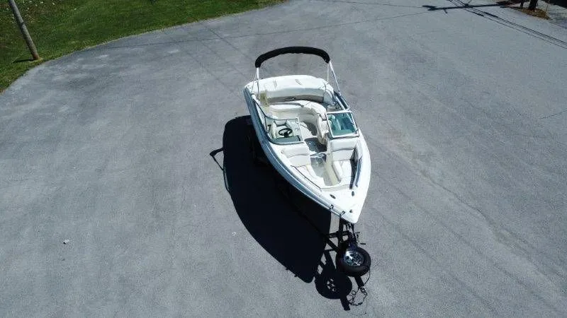 Slide: The Image of Aerial view of a 2009 Caravelle 237 boat on a trailer. - 7
