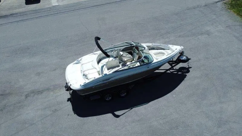 Slide: The Image of Aerial view of a 2009 Caravelle 237 boat on a trailer. - 8