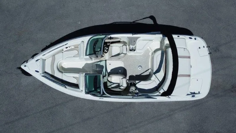 Slide: The Image of Aerial view of a white Caravelle 237 boat, year 2009. - 9