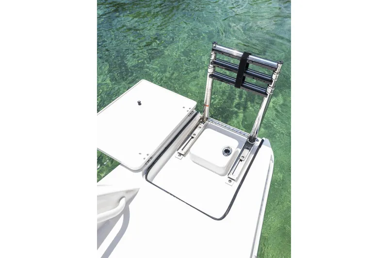 Slide: The Image of 2026 Edgewater boat ladder and hatch over clear water. - 17