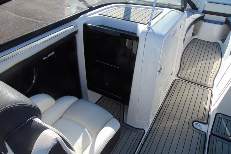 Slide: The Image of Interior view of 2020 Yamaha Boats 242SE, featuring sleek seating and modern design. - 10