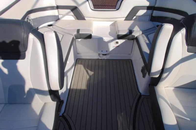 Slide: The Image of 2020 Yamaha Boats 242SE interior with sleek seating and modern design. - 11