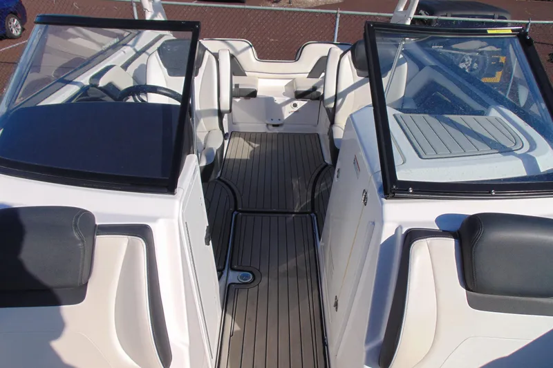 Slide: The Image of 2020 Yamaha Boats 242SE interior with sleek seating and modern design. - 13
