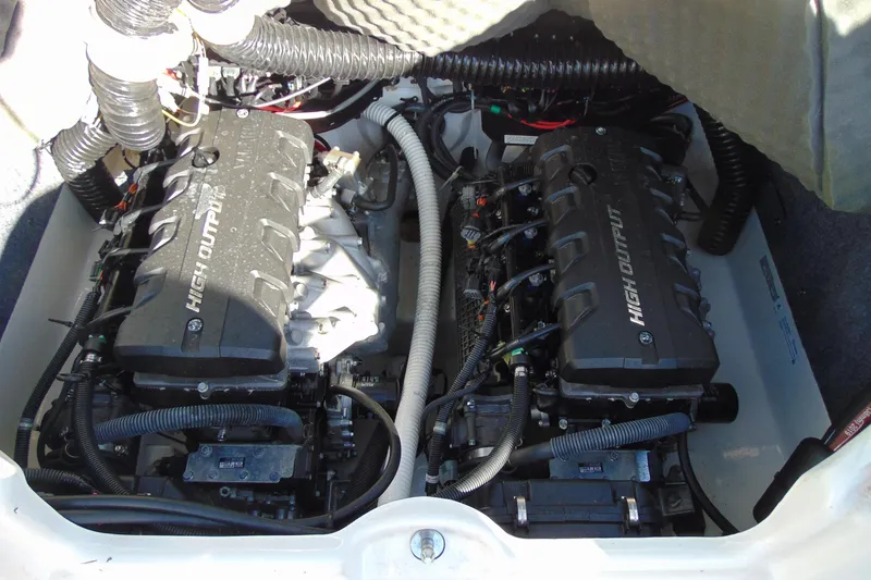Slide: The Image of Engine compartment of a 2020 Yamaha Boats 242SE, featuring dual high-output engines. - 15