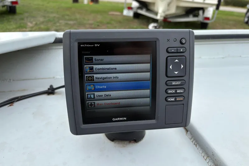 Slide: The Image of Garmin echomap DV on 2011 SeaArk 1448 MV boat, displaying navigation options. - 10